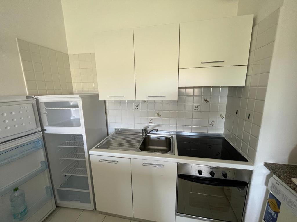 Residence Porto Coda Cavallo ซาน เตโอโดโร ภายนอก รูปภาพ