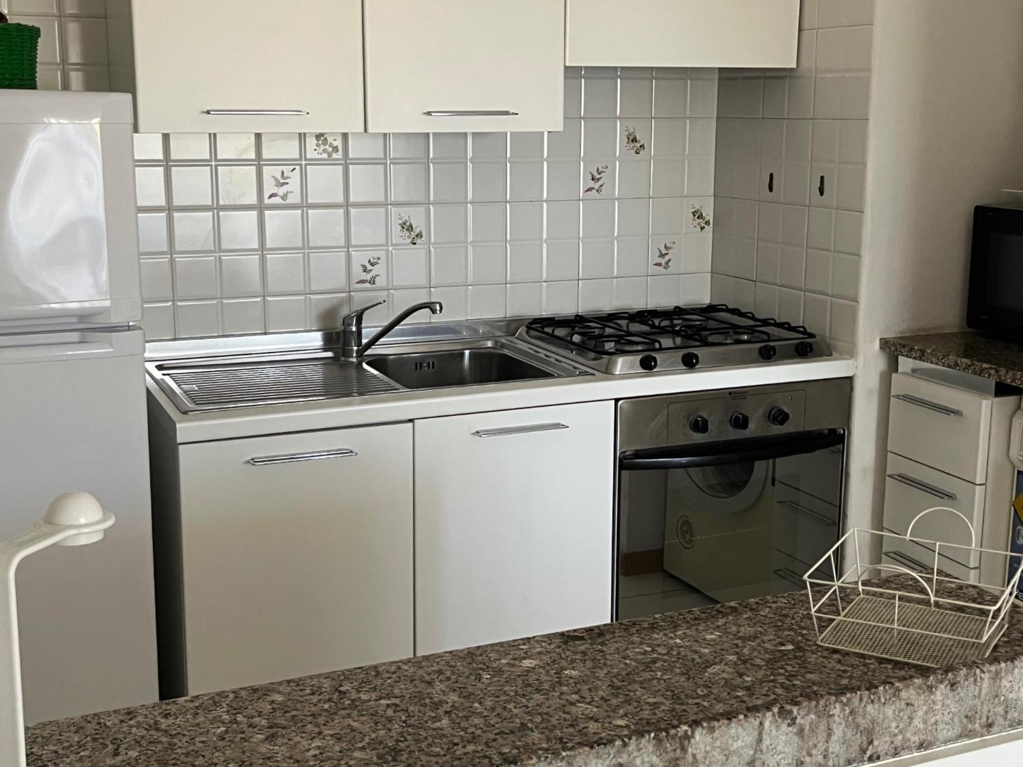 Residence Porto Coda Cavallo ซาน เตโอโดโร ภายนอก รูปภาพ